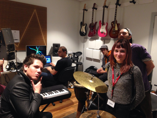 Four students with Dr Gann in studio